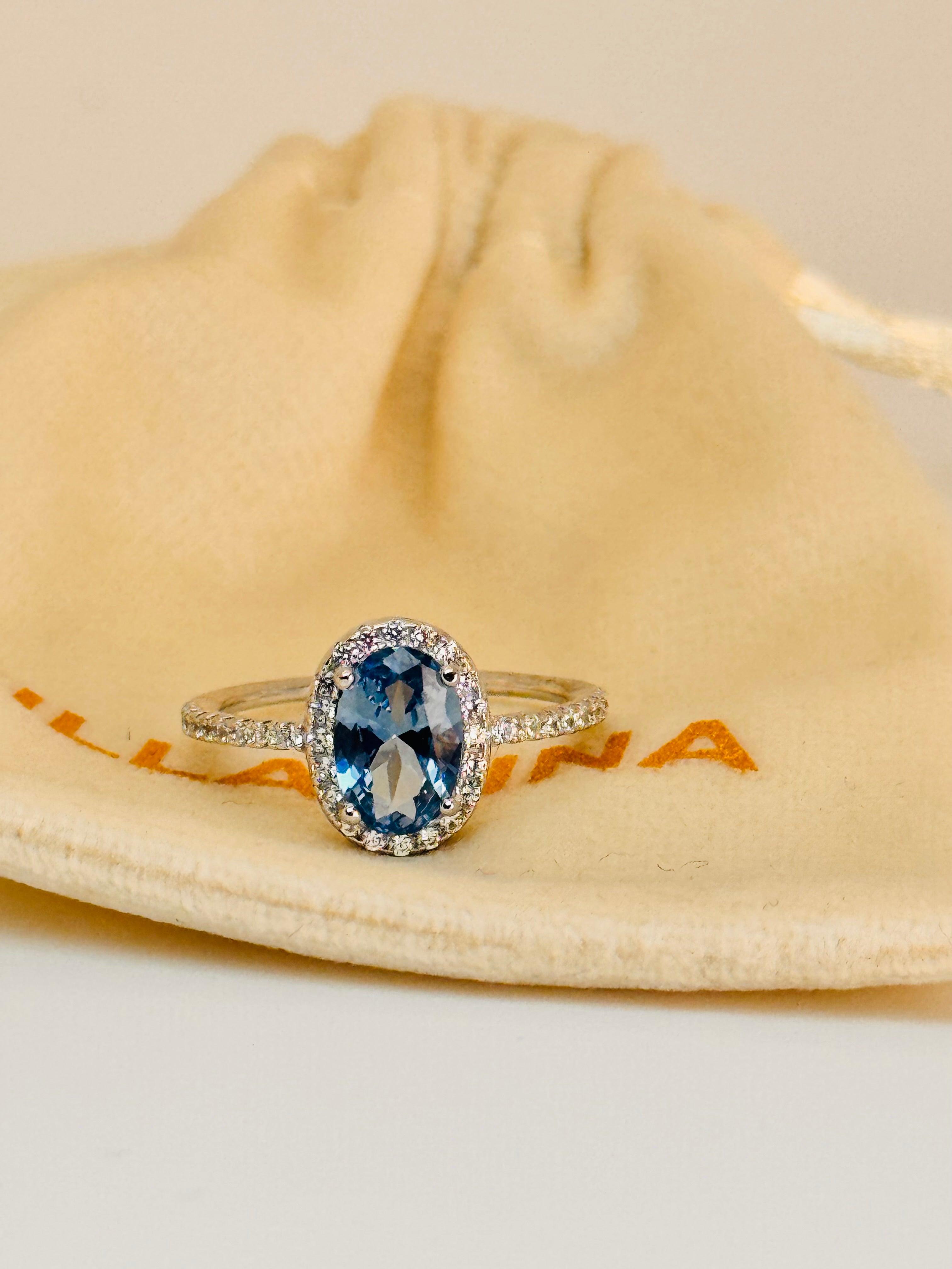 Rhodium Plated Oval Cushion Cut Blue Topaz on Solid 925 Sterling Silver